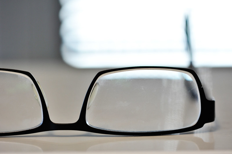 eyeglasses upside down on a table